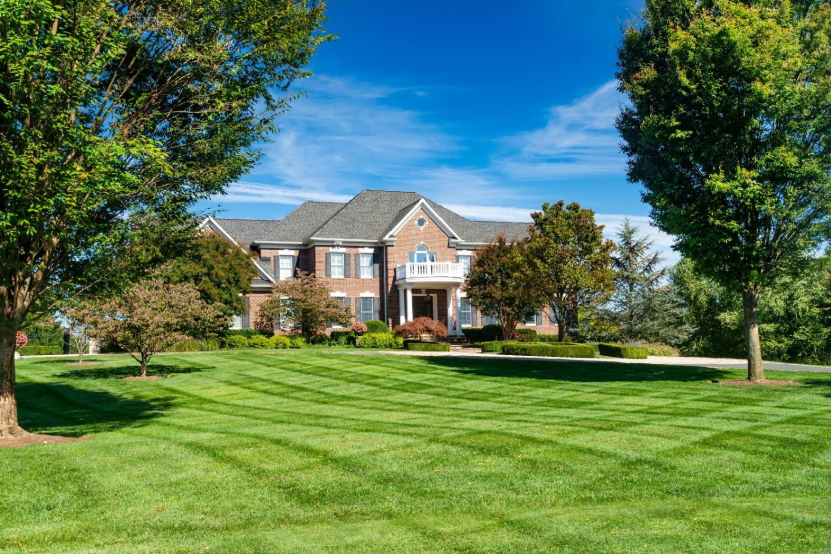 Manicured estate lawn at golden hour