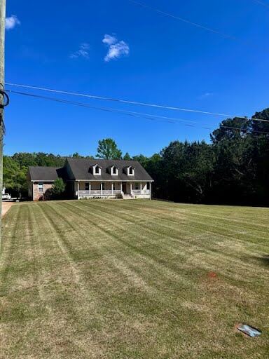 Striped lawn mow on a brick estate in central Georgia